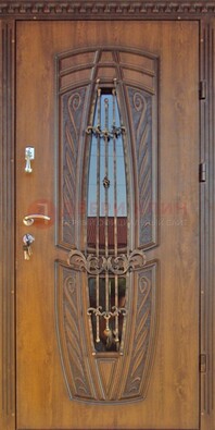 Дизайнерская железная дверь со стеклом и ковкой ДСК-182 в Голицино