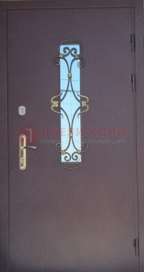 Металлическая дверь со стеклом и ковкой ДСК-77 в Голицино