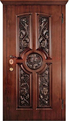 Филенчатая металлическая дверь с виноритом и резьбой ДВТ-69 в Голицино